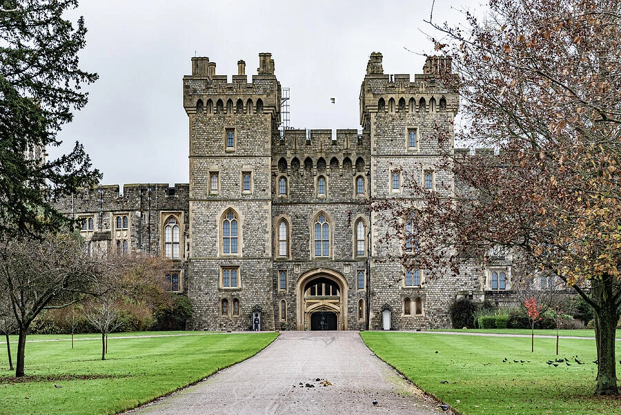 The stone towers and entrance gateway of Windsor Castle in England.